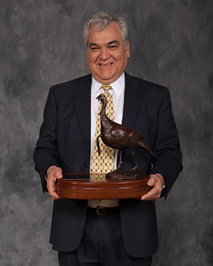 Paul Trianosky, SFI's Chief Conservation Officer, accepts the Land Stewardship Award